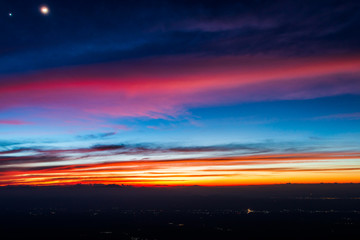 colorful dramatic sky with cloud at sunset.