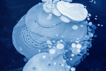 ice backaground, natural ice texture with frozen air bubbles
