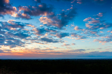 colorful dramatic sky with cloud at sunset.