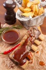 beef ribs with potatoes in parchment with gravy