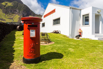 Edinburgh of the Seven Seas, Tristan da Cunha island. E II R red pillar postbox, free-standing post...