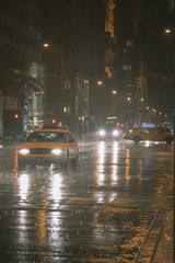 Cab at night in the rain