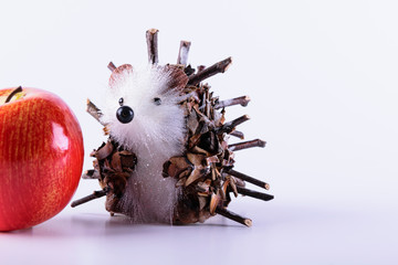 hedgehog toy on white background