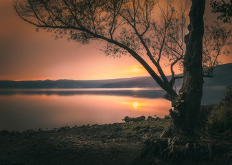 sunset shore lake