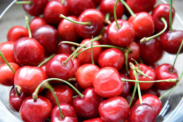 Detail of bowl with red cherries