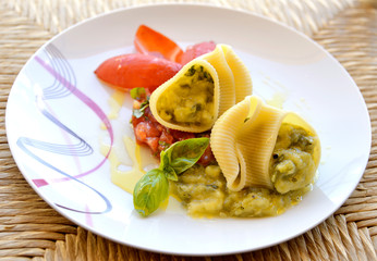 Plate of stuffed pasta with cream of zucchini