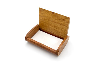 Wooden box for business card isolated from white background.