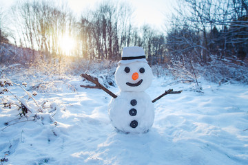 snowman on orange sunset background christmas santa