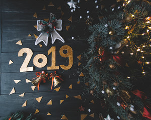 Natural Christmas wreath on black wooden background
