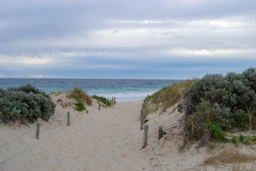 Fototapeta na wymiar Horizontal landscape of a beach in a cloudy day Perth