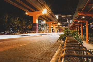 KUALA LUMPUR, MALAYSIA - NOVEMBER 18 2018 : Night traffic light trail at Bandar Sunway in front of the Sunway City. In conjunction with Artbox 2018 event