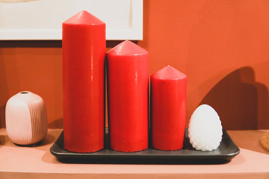 Empty Stockings Hung On Fireplace On Christmas Eve.Red candle arrangement for christmas. - Powered by Adobe