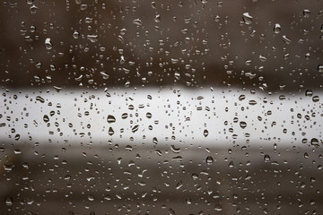Naklejka na ściany i meble Glass after rain, Raindrops on glass