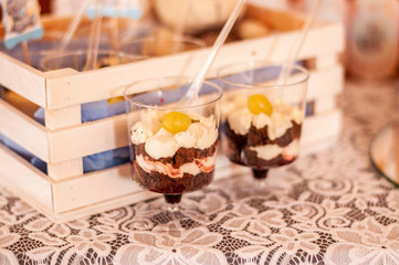 cake with cream and chocolate in the cup