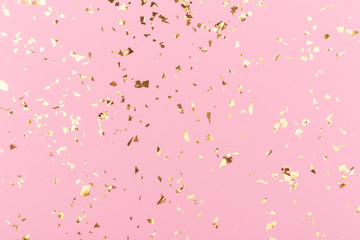 Golden sparkles on pink pastel trendy background. Festive backdrop for your projects. - 236322621