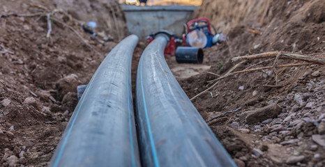 sewer pipes with water are laid underground