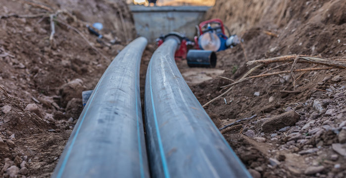 Sewer Pipes With Water Are Laid Underground