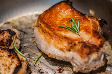 Juicy hot piece of fresh meat with a ruddy toasted crust in a pan