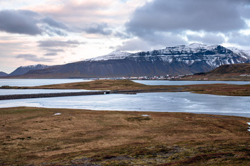 Nice Seaside Village  along the Rugged Coast of Iceland on a Cloudy Autumn Afternoon