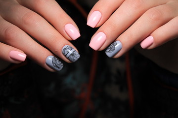 glamorous beautiful manicure on a trendy texture background