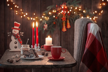 wooden table with Christmas cake and decor