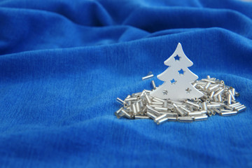 White tree on a blue background. Concept of winter forest