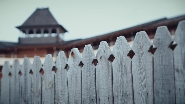 An ancient Slavic pagan city built of wood, excellent scenery for a historical film, old wooden churches and houses, an orthodox cross, summer time, no people in the frame, old Kiev
