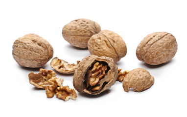 Cracked walnut, isolated on white background