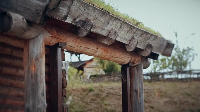 An ancient Slavic pagan city built of wood, excellent scenery for a historical film, old wooden churches and houses, an orthodox cross, summer time, no people in the frame, old Kiev