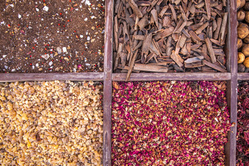 driend frankincense (boswellia serrata) and other spices being sold at a market