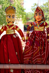 Rajasthani puppets (Kathputli) have been displayed on a shop at Mehrangarh Jodhpur, Rajasthan. Kathputli is a string puppet theatre, native to Rajasthan, India.