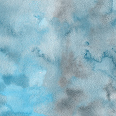 Blue watercolor winter texture with abstract washes and brush strokes on the white paper background. Frozen look.