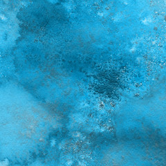 Blue watercolor winter texture with abstract washes and brush strokes on the white paper background.