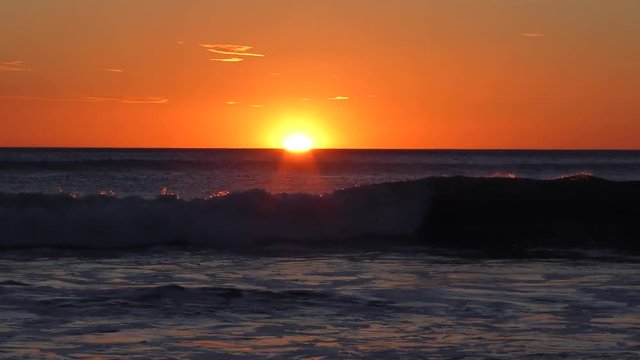 Orange Sunset at the Sea. Evening on the Beach. Seacoast Pacific Ocean in Costa Rica