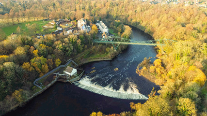 Aerial image of the David Livingstone memorial bridge and Blantyre Weir on the River Clyde.
