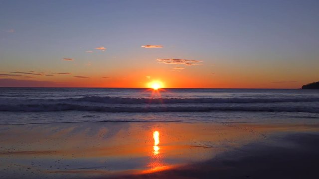 Orange Sunset at the Sea. Evening on the Beach. Seacoast Pacific Ocean in Costa Rica