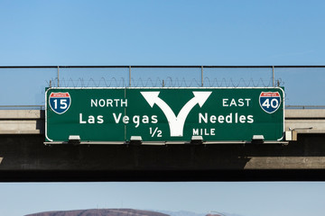 Las Vegas Interstate 15 and 40 freeway arrow sign in the Mojave desert near Barstow, California.  