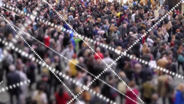 Crowd of people with streams of data flying around.  A large crowd of people standing waiting with lines of binary code criss-crossing above their heads.