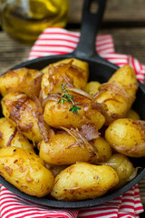 Roasted baby potatoes with onions caramelized in soy sauce