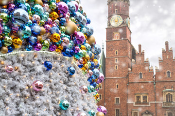Christmas balls with reflected old city buildings, on the background of the Old Town Hall of Wroclaw (Stary Ratusz, Breslauer Rathaus), Poland