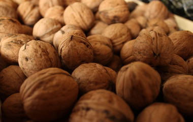 Abstract background with a bunch of walnuts and a blurred background around the edges