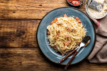 pasta carbonara, spaghetti, cooked according to the traditional Italian recipe pasta alla carbonara with egg sauce and fried pancetta