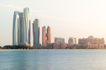 Fototapeta na wymiar Abu Dhabi city skyline, beautiful view of the Etihad towers and Emirates Palace