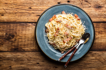 pasta carbonara, spaghetti, cooked according to the traditional Italian recipe pasta alla carbonara with egg sauce and fried pancetta