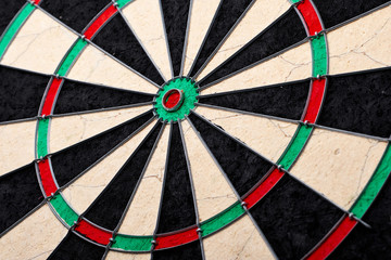 Hitting in the target center of dartboard. Targeting the business concept. Bullseye of a Dartboard