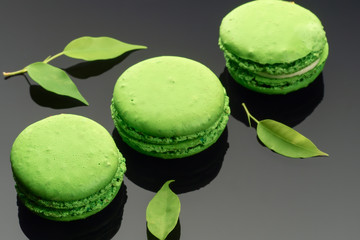 Colorful green yellow French sweet Macaroons dessert cake