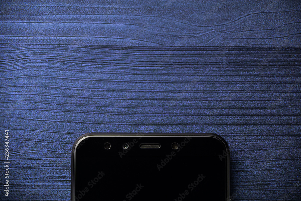 Poster frameless mockup smartphone on office desk. copy space. empty space for text. top view