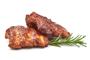 Char-Grilled Ribs with herbs, isolated on a white background. Close-up