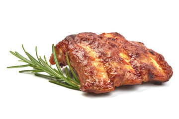 Pork Ribs Oven Baked Barbecue with herbs, isolated on a white background. Close-up