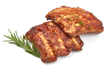 Grilled Ribs with Barbecue Sauce with herbs, isolated on a white background. Close-up